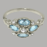 Prsten od srebra izrađen u Velikoj Britaniji sa sintetičkim kubičnim cirkonijem i prirodnim plavim topazom ženski