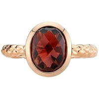 Prsten pasijansa od crvenog granata ovalnog oblika 14k ružičastog zlata